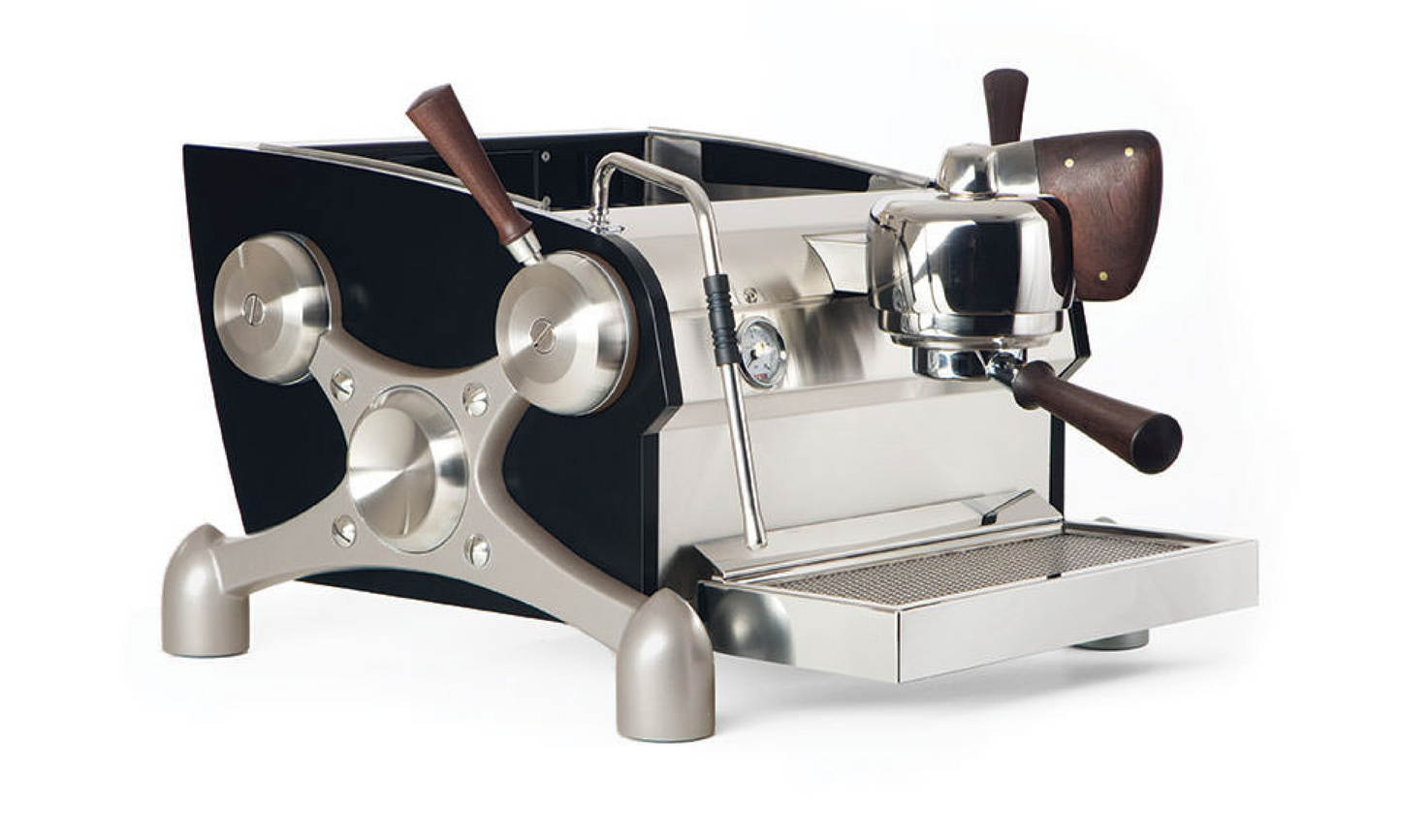 The SLAYER Espresso Single - Front The Dream Machine
Standard configuration features silver powder-coated X’s, black powder-coated side and rear body panels, and actuators finished in European ash.