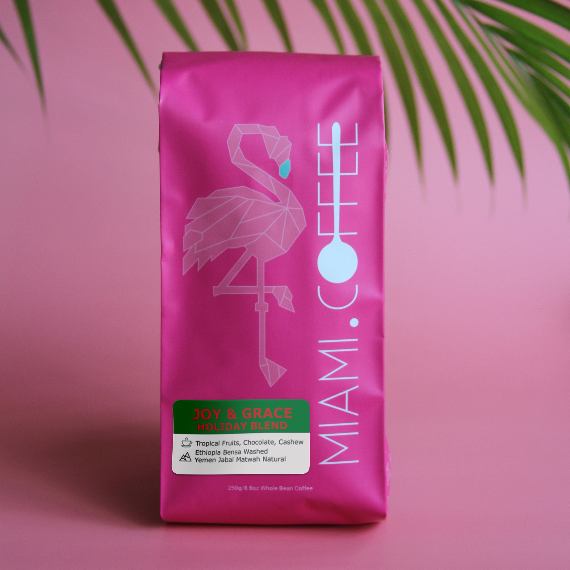 Joy & Grace Holiday Blend 9oz bag by Miami (dot) Coffee. Flavor descriptors: Tropical Fruits, Chocolate, Cashew